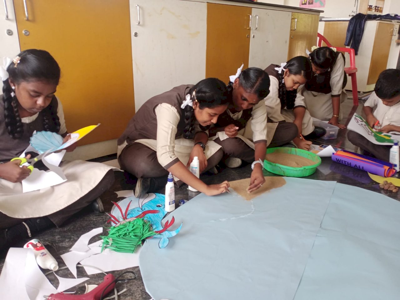 "Ocean Heroes in action!" Our students spreading a...